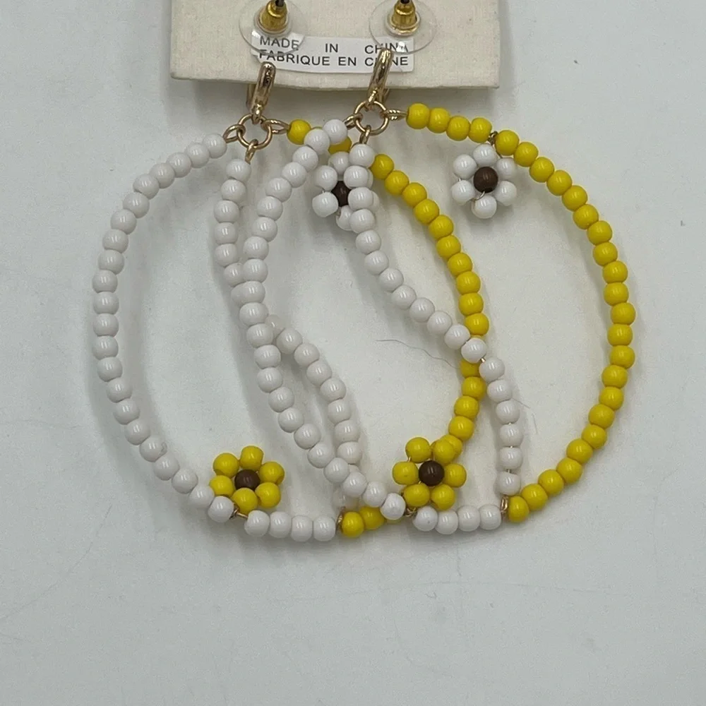FREE PEOPLE AMONG THE‎ WILDFLOWERS HOOP YIN AND YANG YELLOW/WHITE  EARRINGS